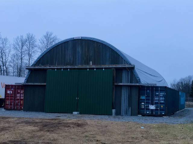 The dome storage building and outdoor yard